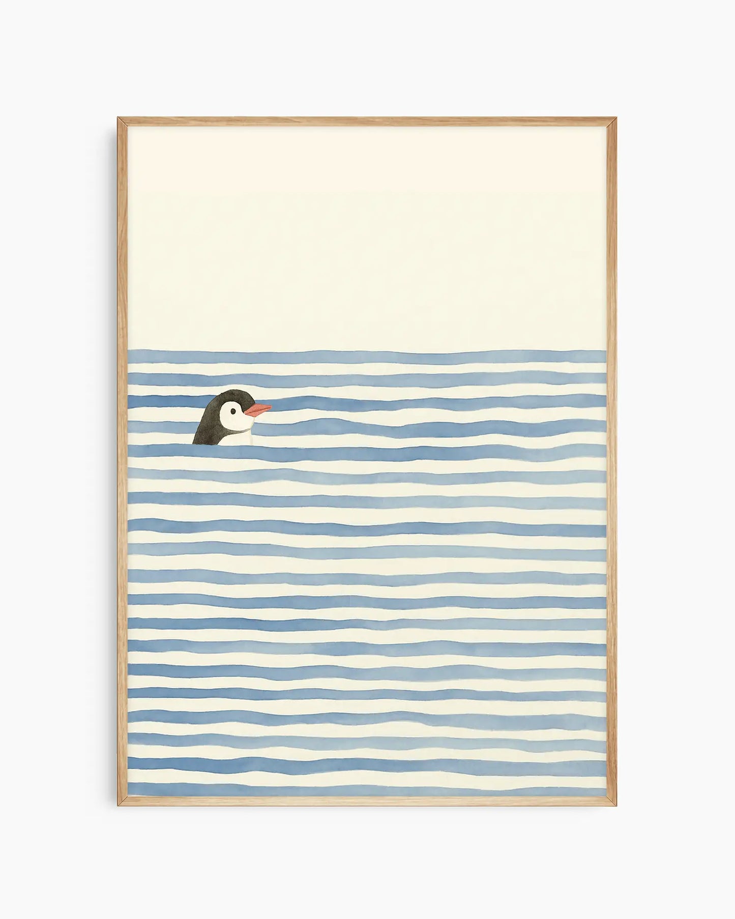 Children's poster of a swimming penguin with an oak frame.