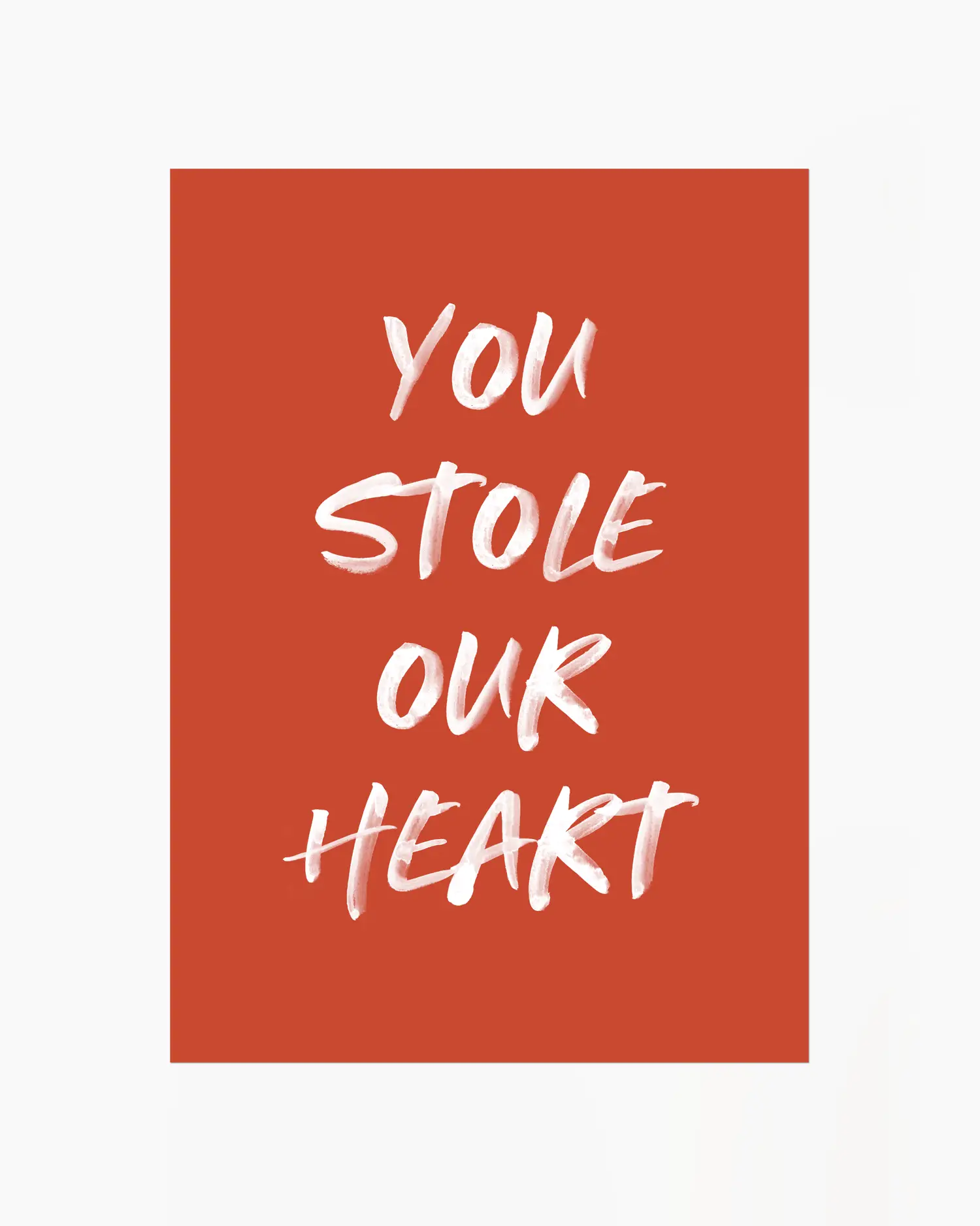 Nursery poster with white text 'You stole our heart' on a red background.