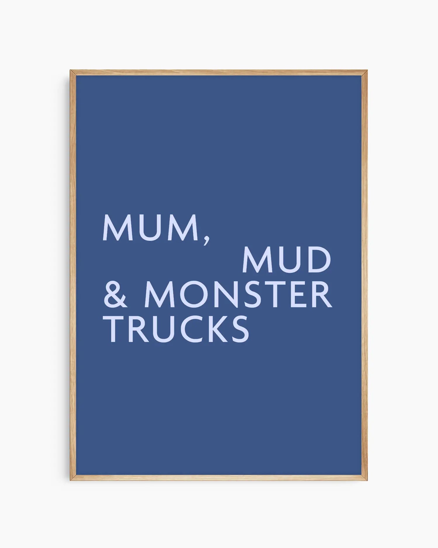 Poster with light blue text 'MUM, MUD & MONSTER TRUCKS' on a dark blue background in an oak wooden frame.