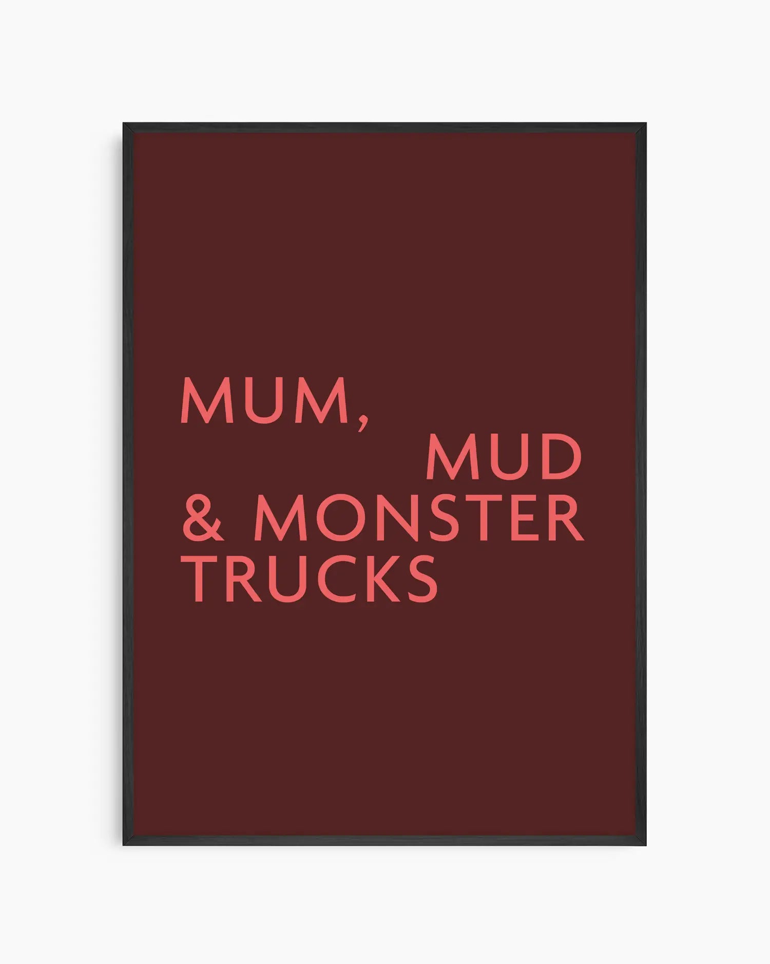 Poster with red text 'MUM, MUD & MONSTER TRUCKS' on a burgundy background in a black wooden frame.