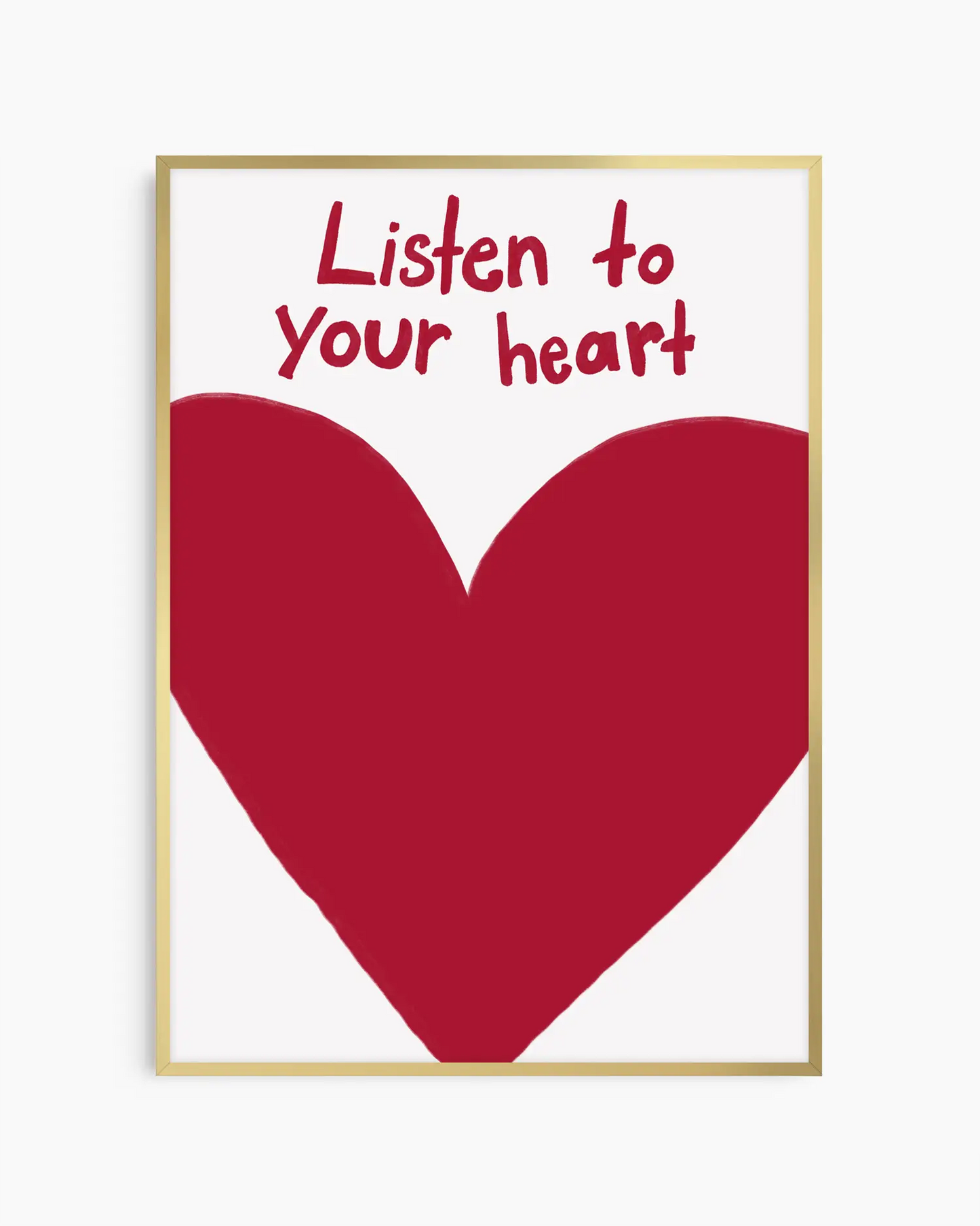 Framed poster with a red heart and 'Listen to your heart' text on a white background