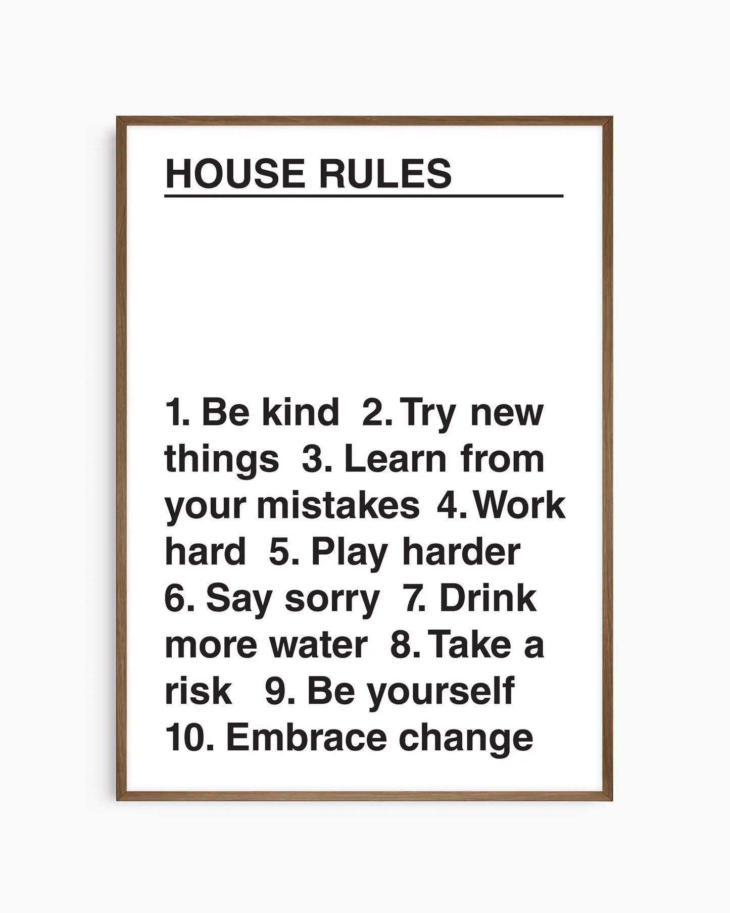 Framed list of house rules on a white background