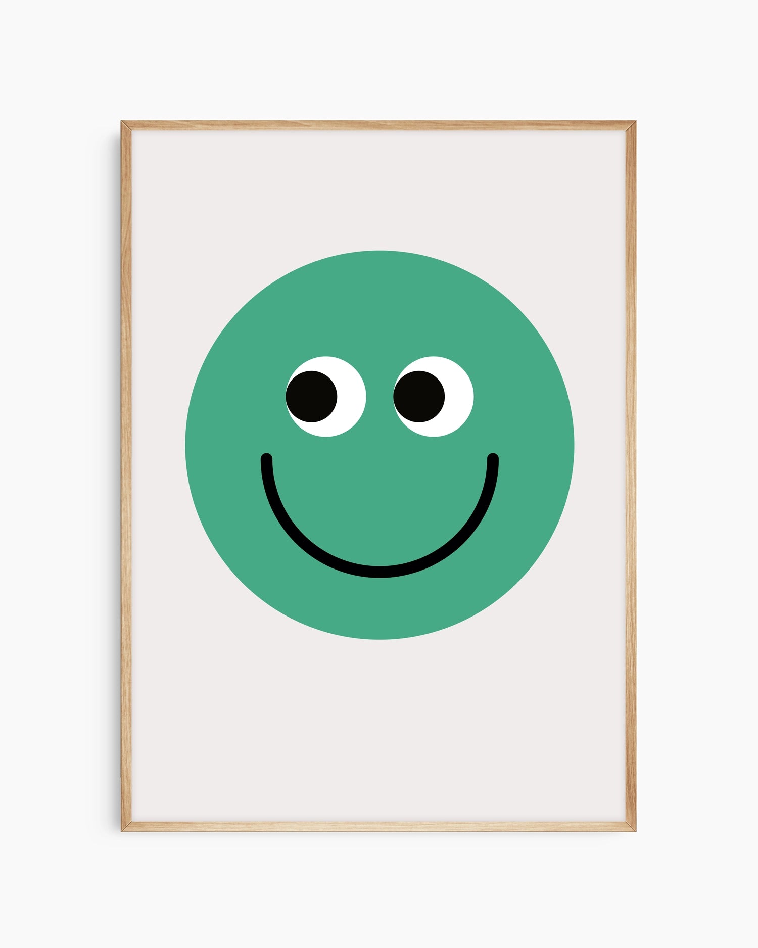 Framed poster with a green smiley face on a white background