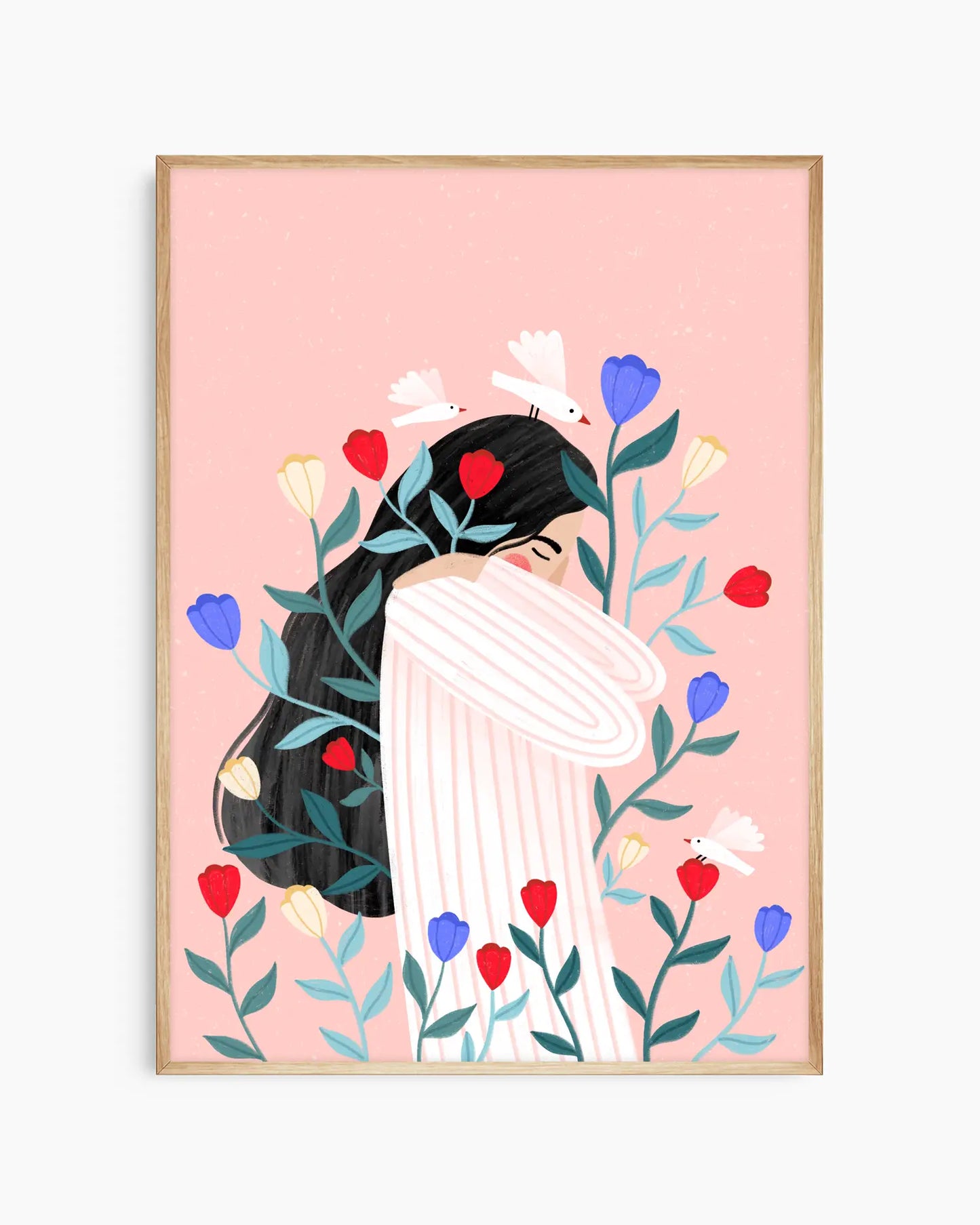 Framed artwork of a stylized woman with flowers on a pink background