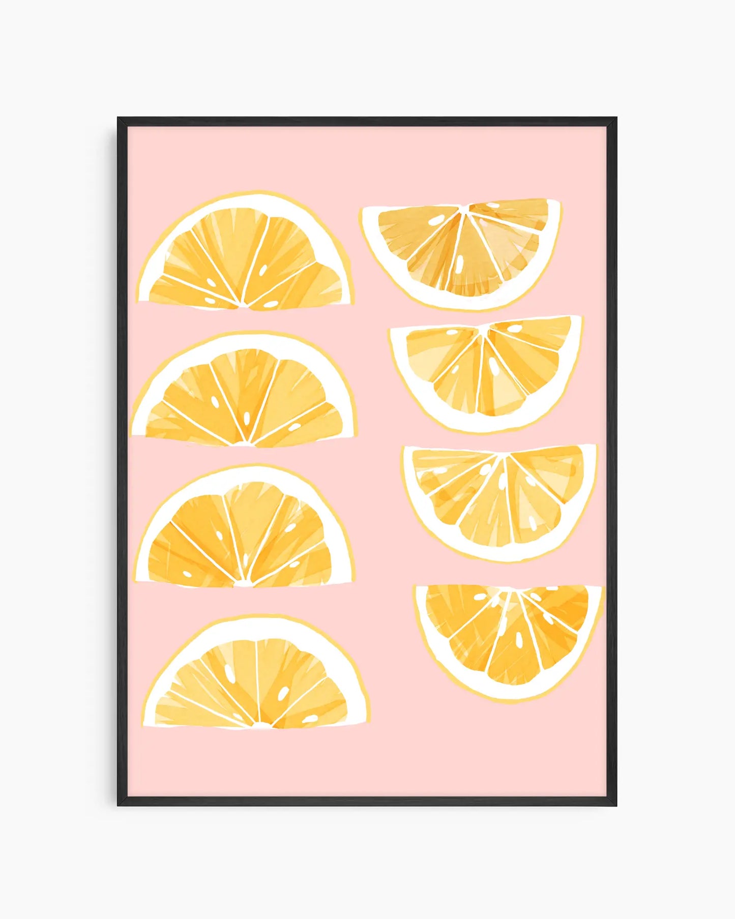 Framed artwork with lemon slices on a pink background