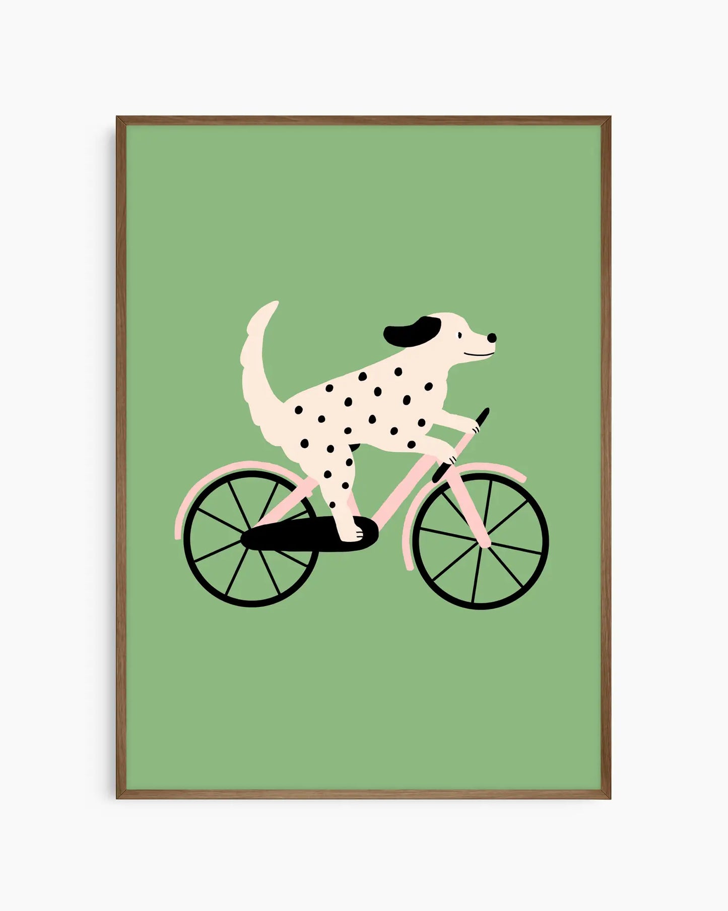Framed artwork of a dalmatian dog riding a bicycle on a green background