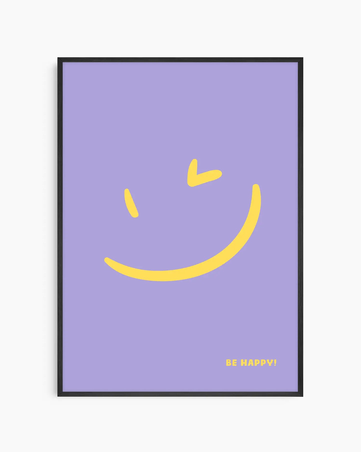 Nursery poster with a yellow smiley face and 'BE HAPPY!' text on a purple background framed in a black wooden frame.