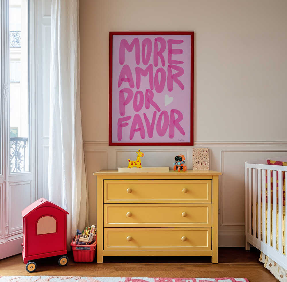 Framed nursery poster with pink text 'MORE AMOR POR FAVOR' on the wall in the kids' room.