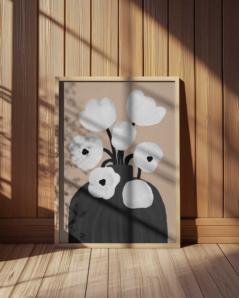 Minimalist floral art print featuring white poppy-like flowers in a black vase on a beige background. Displayed in a light wooden frame leaning against a wooden wall with warm sunlight and shadows. Elegant botanical wall art perfect for modern Scandinavian interiors.