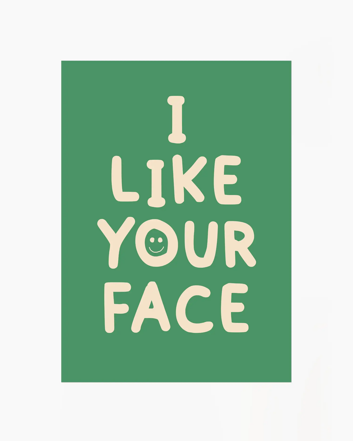Green nursery poster with the text 'I like your face' written in beige.