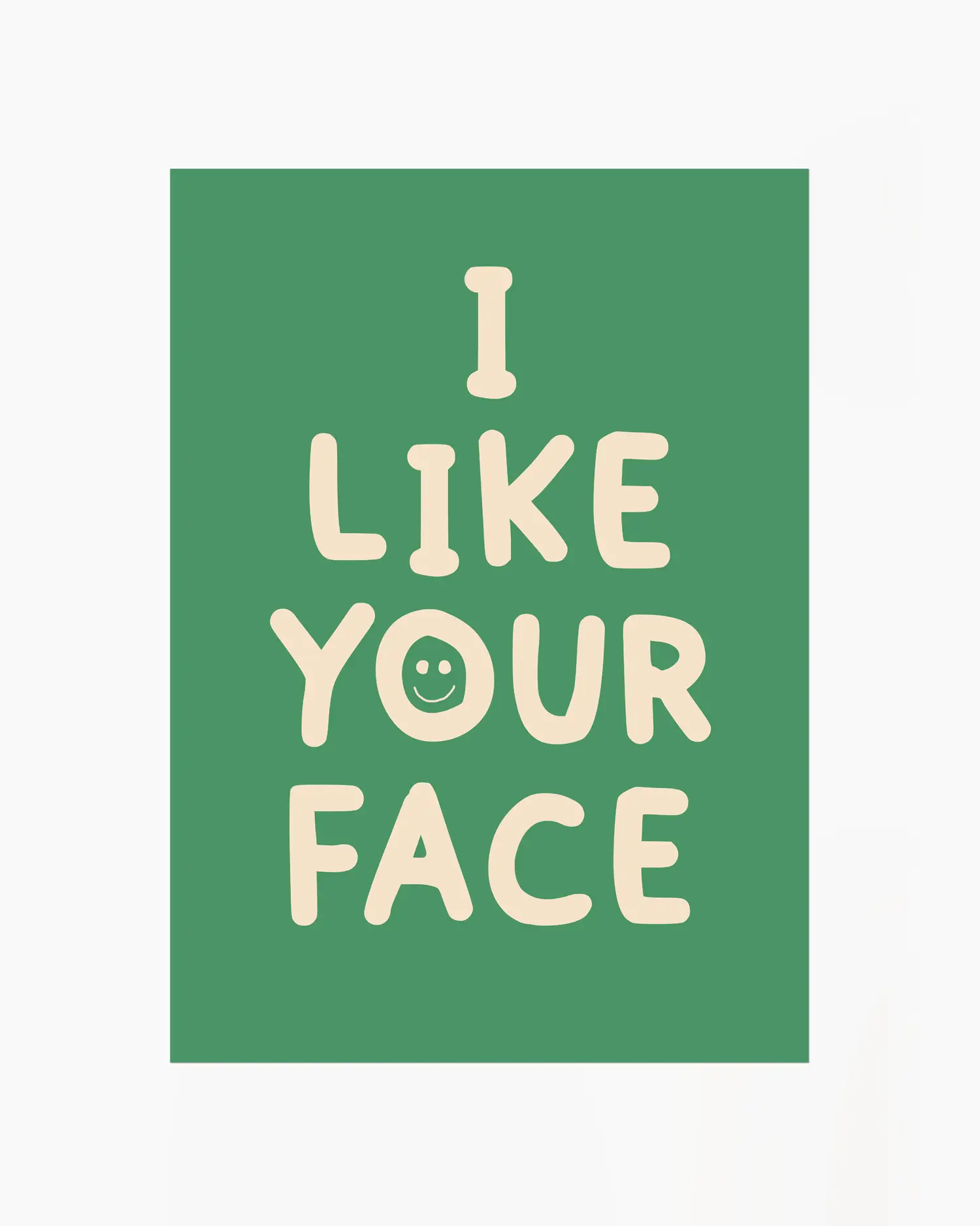 Green nursery poster with the text 'I like your face' written in beige.
