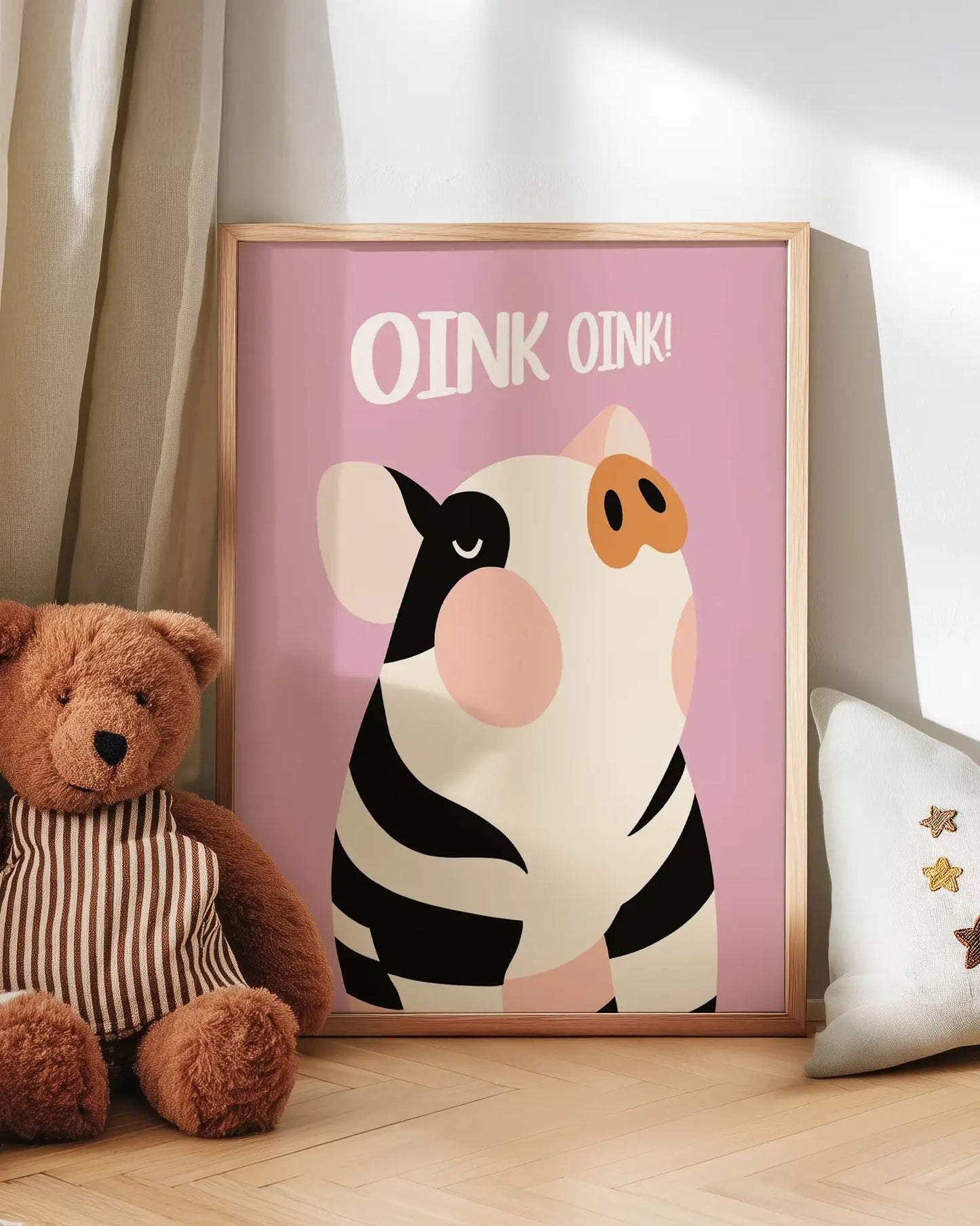 Children's poster with a cartoon pig and 'OINK OINK!' text, next to a teddy bear and pillow.