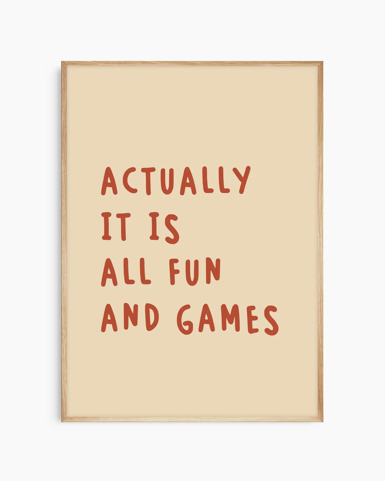 Beige nursery poster with the text 'Actually it is all fun and games'  framed in an oak frame
