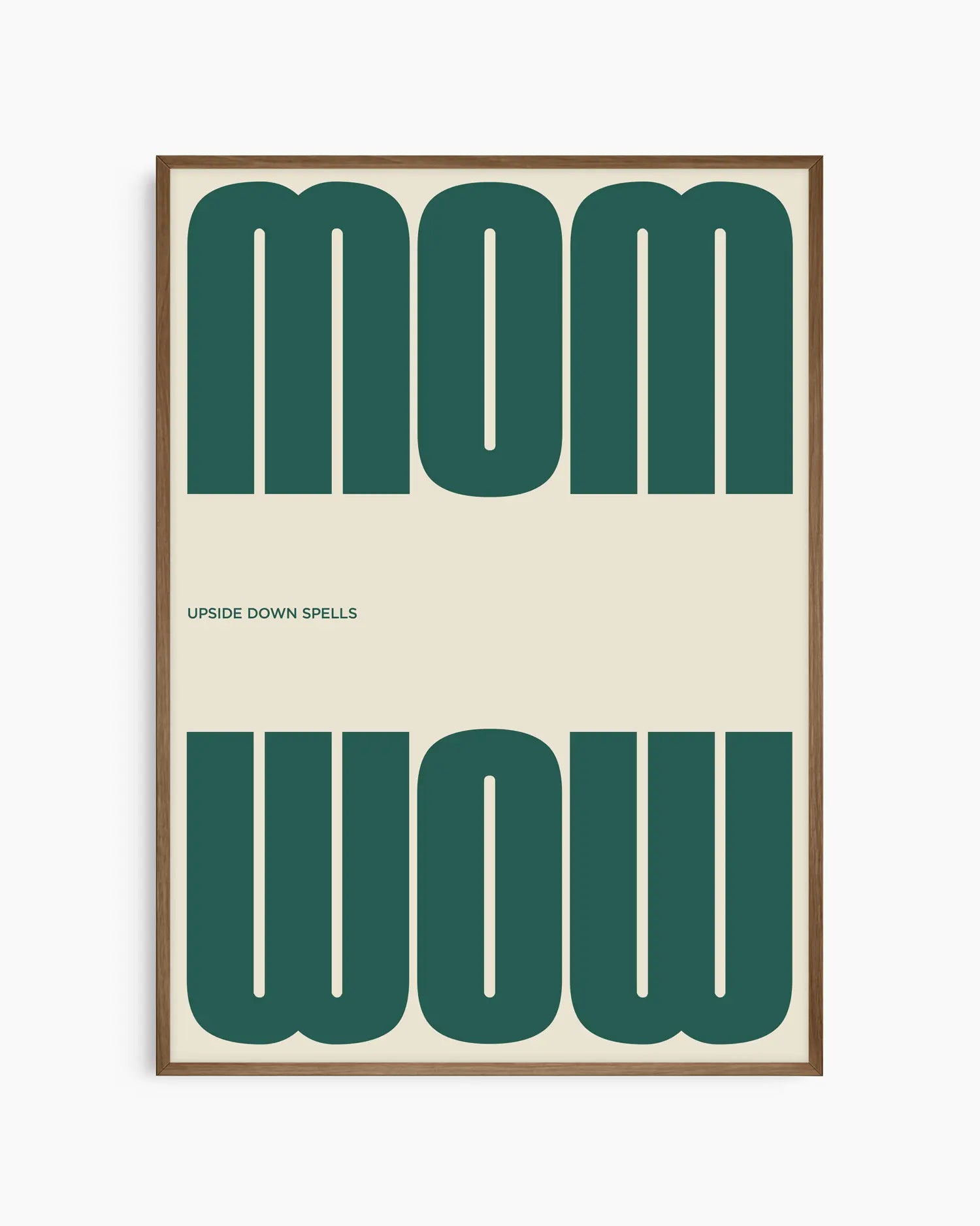 Poster with the green text 'MOM upside down spells WOW' in a minimalistic design on a beige background, framed in a smoked oak wooden frame. 