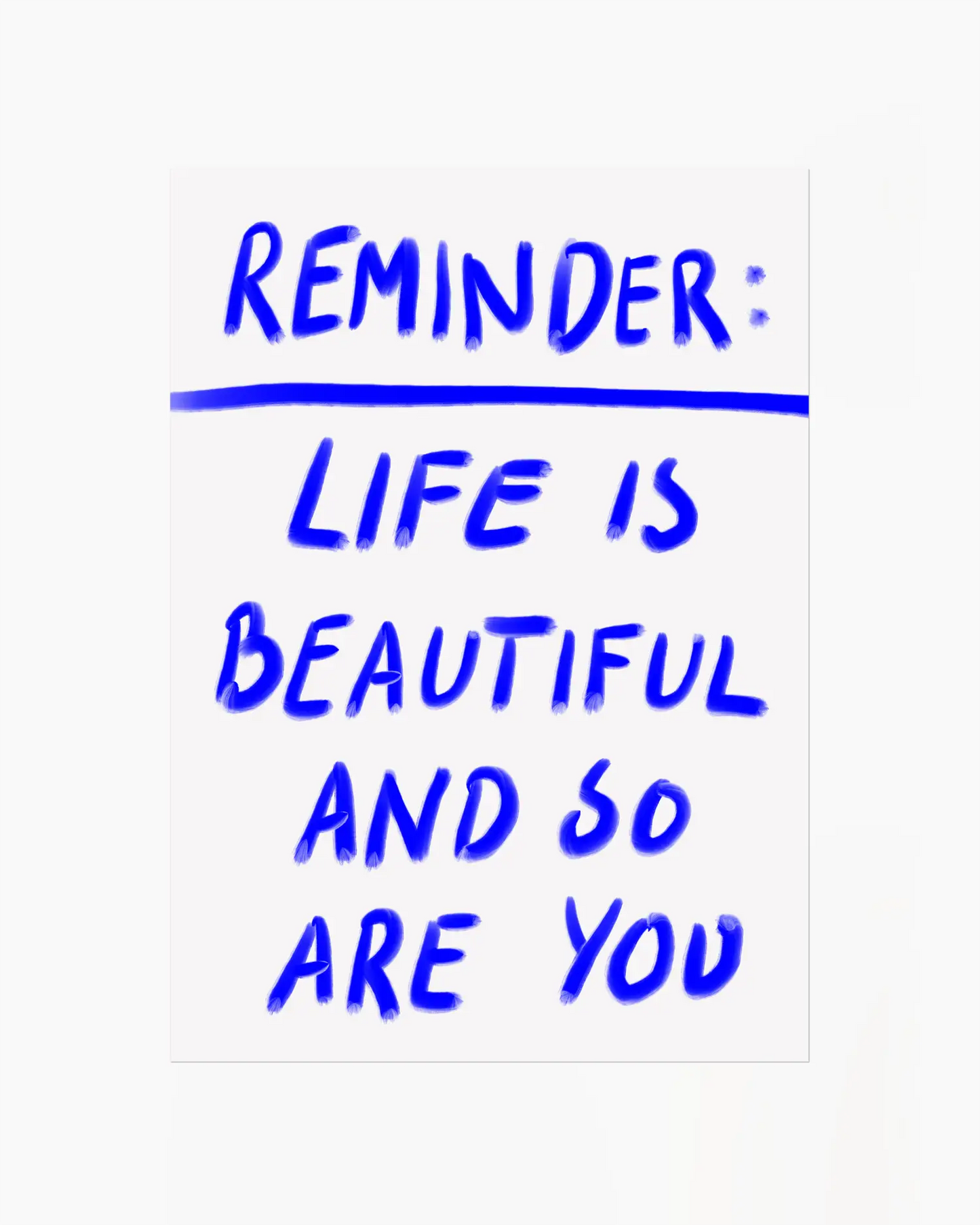 Motivational quote 'Reminder: Life is beautiful and so are you' in blue text on a white background