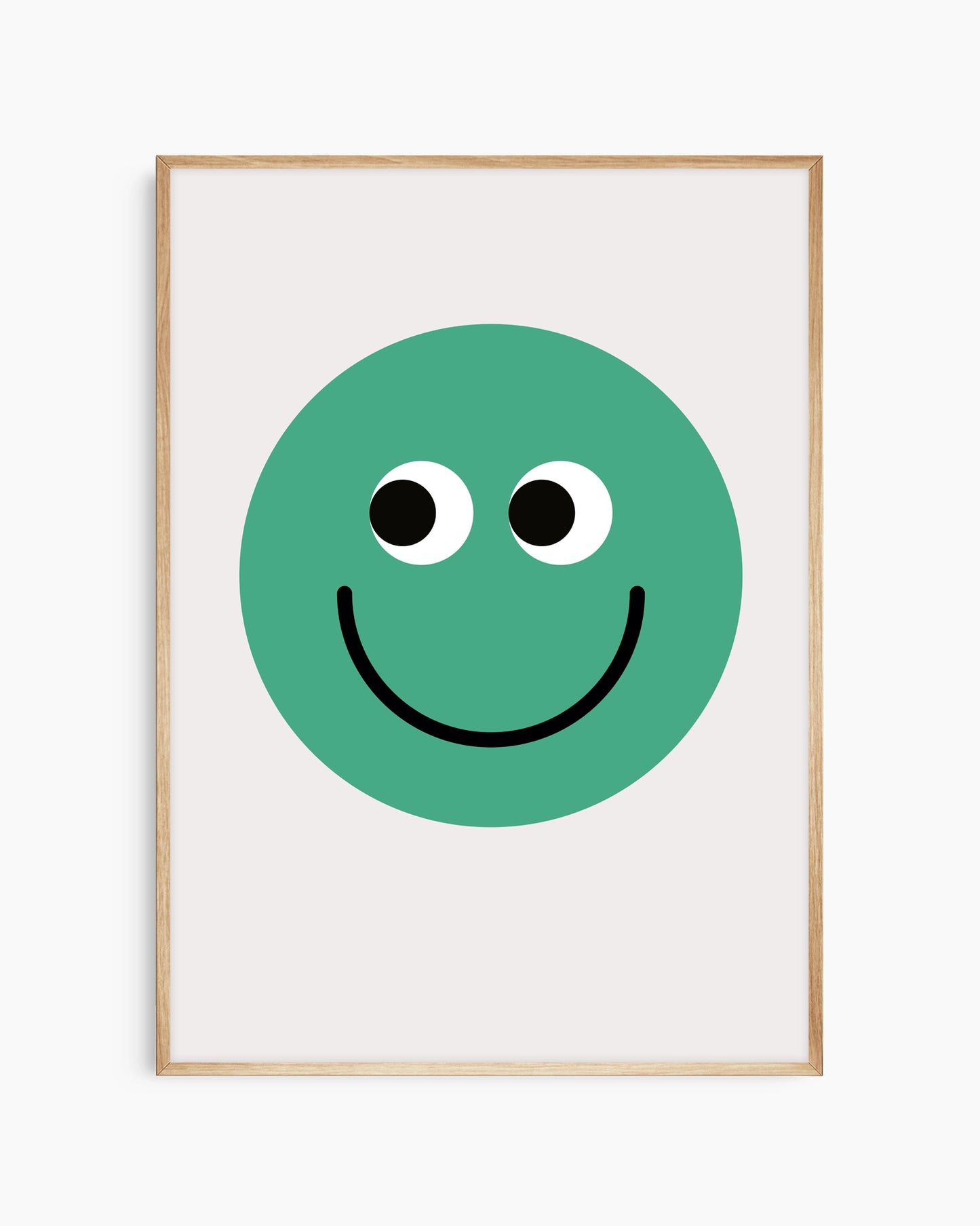 Framed poster with a green smiley face on a white background