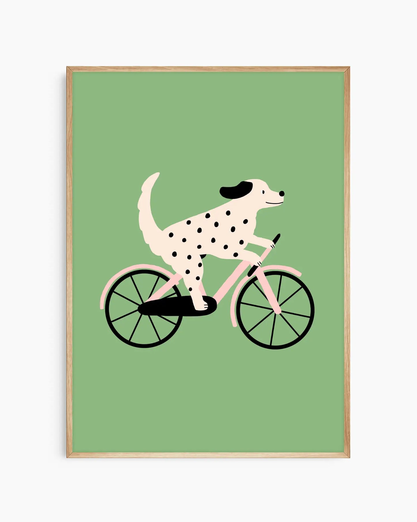 Framed artwork of a dalmatian dog riding a bicycle on a green background