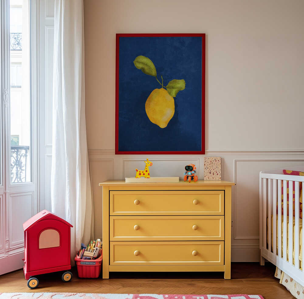 Framed lemon wall art hanging above a yellow dresser in a playful kids room. Soft watercolor fruit illustration with deep blue background, perfect for nursery decor, kids playroom art, or Mediterranean fruit-themed interiors.